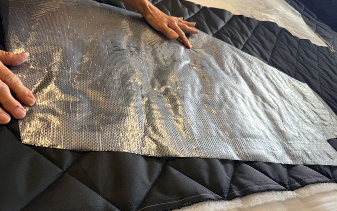 Preparing material layers for a custom quilted vehicle solar screen